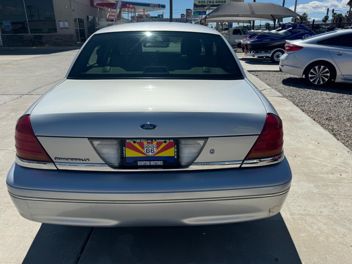 2003 Silver Ford Crown Victoria (2FAFP74W53X) , located at 2190 Hwy 95, Bullhead City, AZ, 86442, (928) 704-0060, 0.000000, 0.000000 - 2003 Ford Crown Victoria LX 2 owner clean title. Super clean. Completely serviced. ice cold a/c. Free Warranty. In house financing. - Photo#3